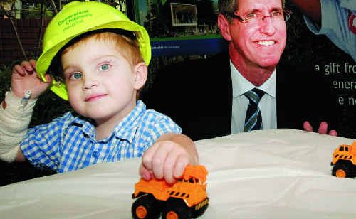 Bryce Marshall, 4, with Dr Peter Steer, the CEO of Children’s Health Services, on Friday, when the first floor of the new Queensland Children’s Hospital was completed. Bryce Marshall, 4, with Dr Peter Steer, the CEO of Children’s Health Services, on Friday, when the first floor of the new Queensland Children’s Hospital was completed.